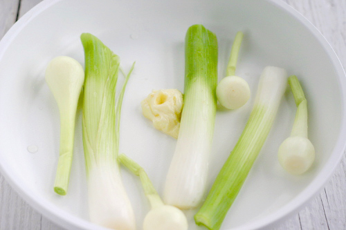 uncooked scallions and baby onions