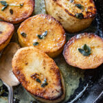 Fondant potatoes in a cast iron skillet